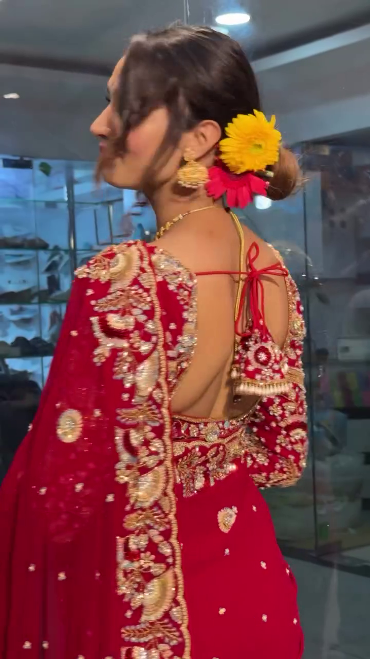Radiant Beauty: Red Bridal Saree with Golden Embroidery - Image 2
