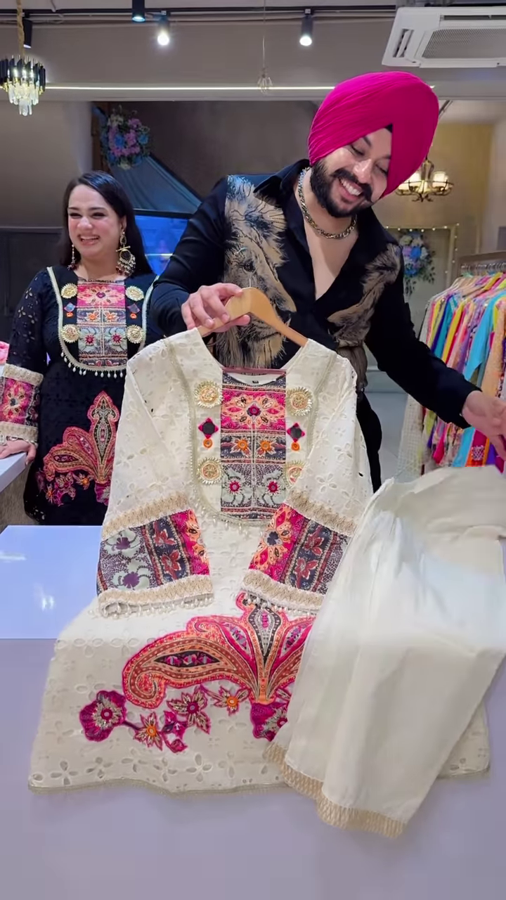 Black Embroidered Ethnic Dress with Multicolor Floral and Geometric Patterns, Tassel Accents - Image 4